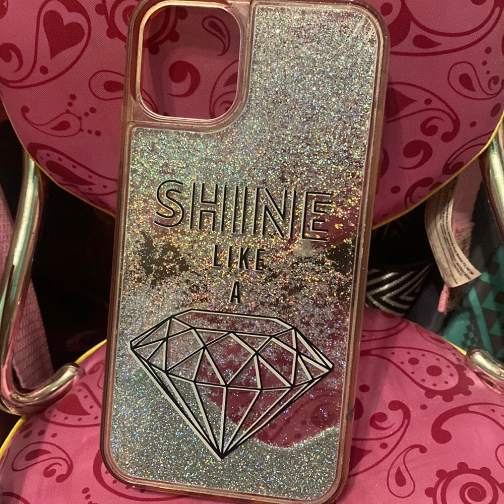 iPhone 11 case been used a few times for pictures. Dose t need it anymore.